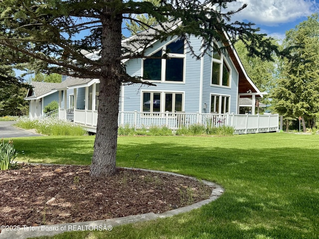 388 Middle Branch Dr, Star Valley Ranch, WY 83127 - view of side of home featuring a lawn