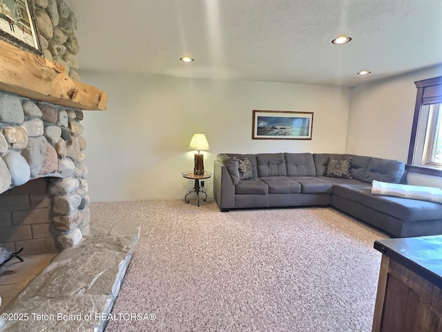 6352 W 1170 N, Driggs, ID 83442 - living room with carpet floors, recessed lighting, and a fireplace