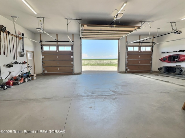 6352 W 1170 N, Driggs, ID 83442 - garage with a water view and a garage door opener