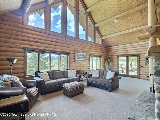 6352 W 1170 N, Driggs, ID 83442 - carpeted living room featuring high vaulted ceiling, rustic walls, and wood ceiling with exposed beams