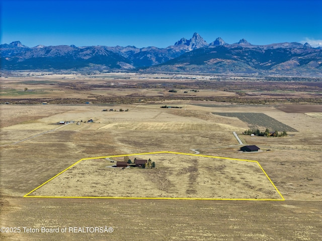 6352 W 1170 N, Driggs, ID 83442 - overview of rural landscape featuring a mountain backdrop and property parcel outlined
