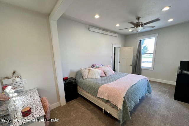 bedroom featuring dark colored carpet and ceiling fan