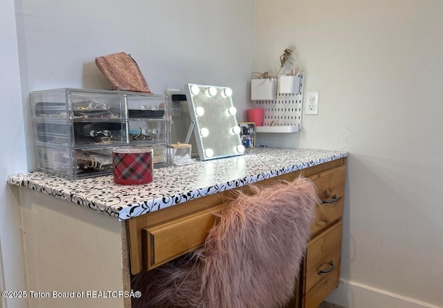 kitchen with light stone countertops