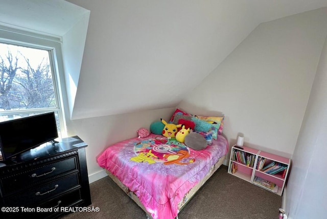 carpeted bedroom featuring vaulted ceiling