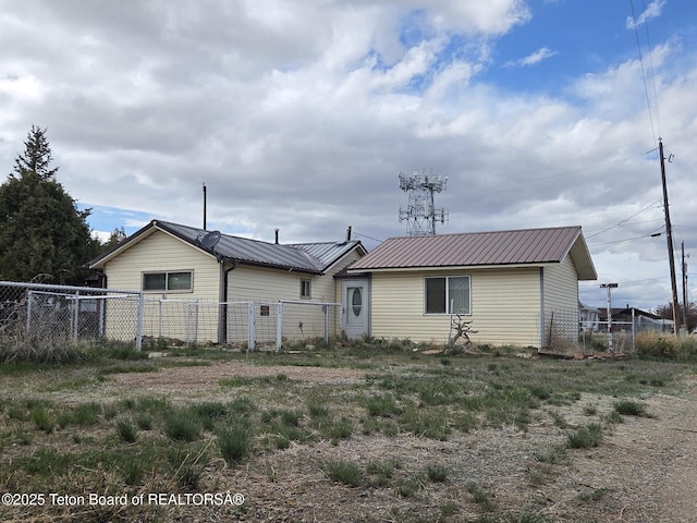 159 Oak St, Labarge, WY 83123 - rear view of house with a metal roof