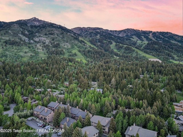 aerial view at dusk with a mountain view