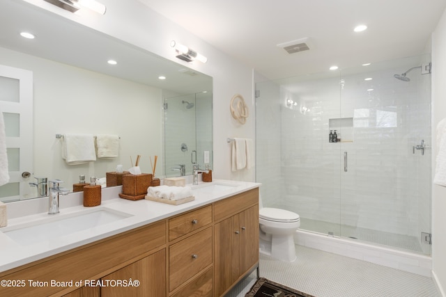 725 Cache Creek Dr, Jackson, WY 83001 - bathroom featuring walk in shower, tile patterned floors, toilet, and vanity