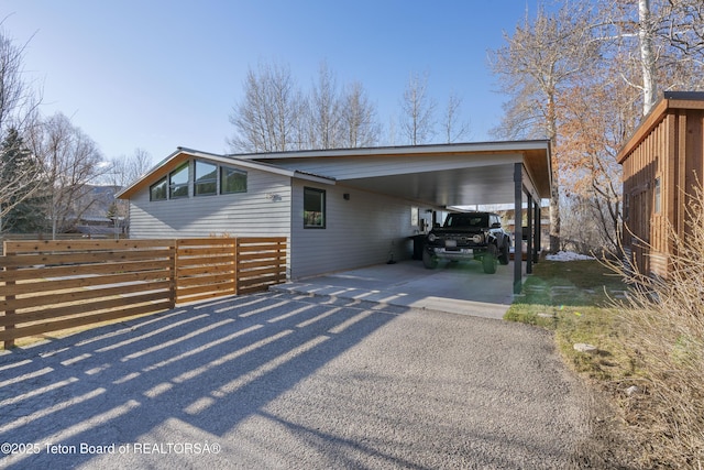 725 Cache Creek Dr, Jackson, WY 83001 - view of front of property with a carport