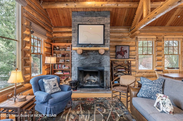 living room featuring wood ceiling, a stone fireplace, wood-type flooring, and lofted ceiling with beams