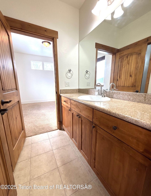 bathroom with vanity and tile patterned flooring