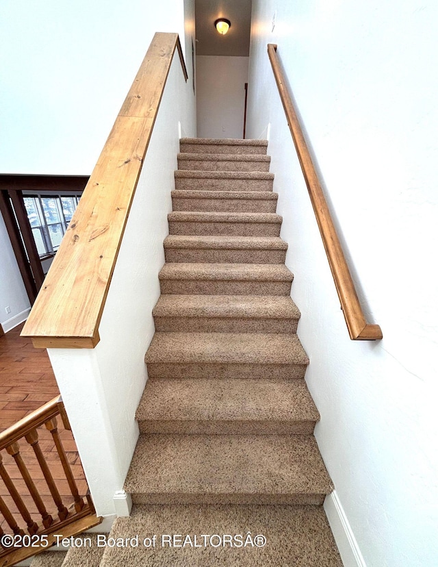 stairway with baseboards