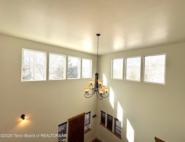 interior details with an inviting chandelier