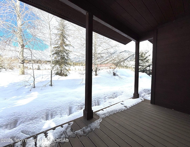 view of snow covered deck