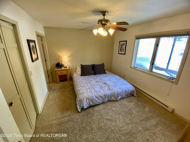 bedroom with a ceiling fan, a baseboard radiator, baseboards, and carpet