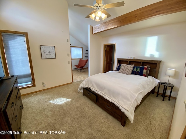 bedroom featuring light colored carpet, vaulted ceiling with beams, and baseboards