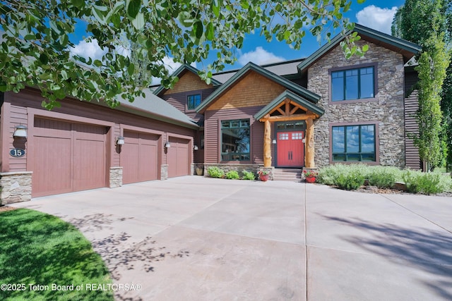15 Kearsley Ln, Victor, ID 83455 - craftsman-style home with stone siding and driveway