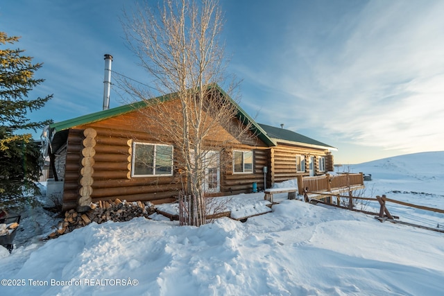 exterior space featuring log siding