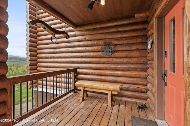 wooden deck with ceiling fan