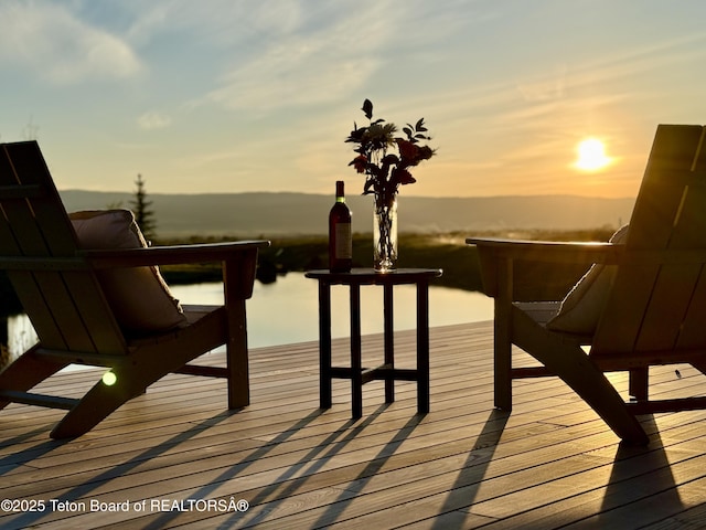 1105 Shasta Daisy Ct, Driggs, ID 83422 - deck at dusk with a water view