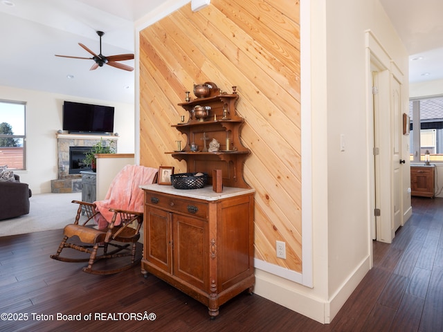 70 Baywood Dr, Driggs, ID 83422 - hallway featuring wood walls, baseboards, dark wood finished floors, and recessed lighting