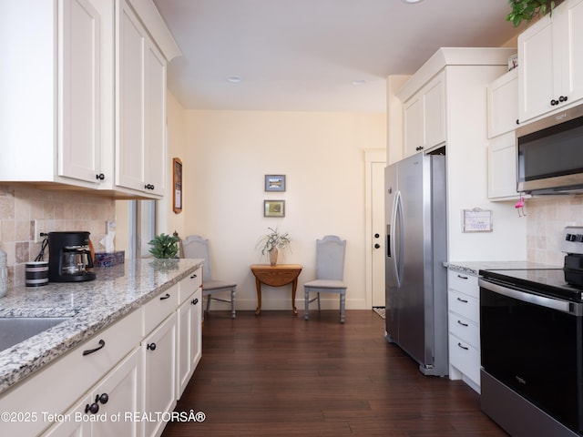 70 Baywood Dr, Driggs, ID 83422 - kitchen with appliances with stainless steel finishes and white cabinetry