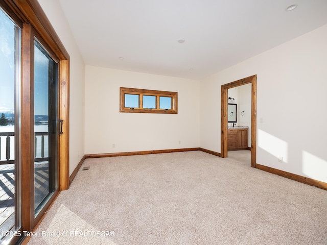 4660 Pale Morning Dr, Tetonia, ID 83452 - unfurnished room with light colored carpet and baseboards