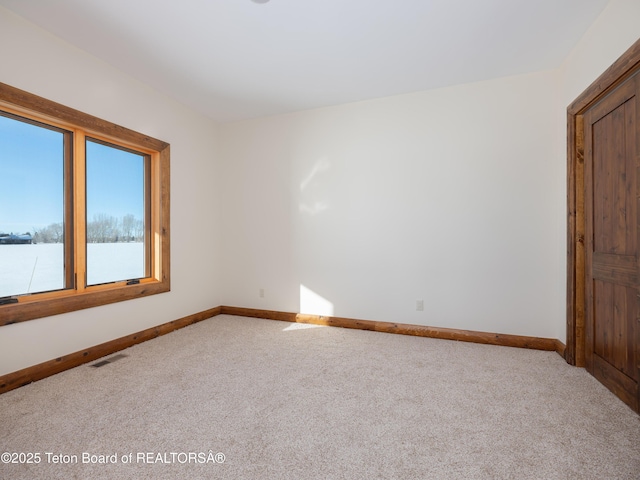 4660 Pale Morning Dr, Tetonia, ID 83452 - unfurnished room featuring carpet, visible vents, and baseboards