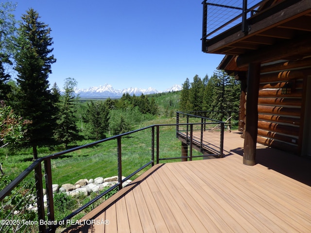 deck with a wooded view