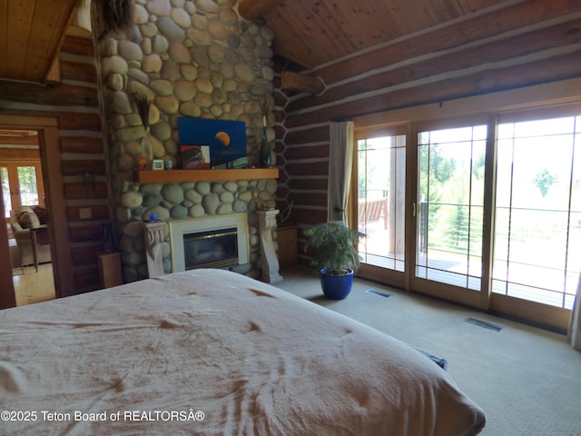 unfurnished bedroom featuring wood ceiling, a fireplace, visible vents, and access to exterior