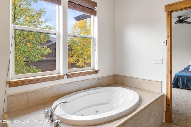 full bathroom featuring a whirlpool tub