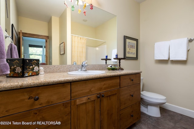 bathroom featuring baseboards, toilet, tile patterned floors, curtained shower, and vanity