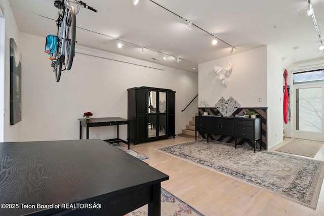 interior space featuring stairs and wood finished floors