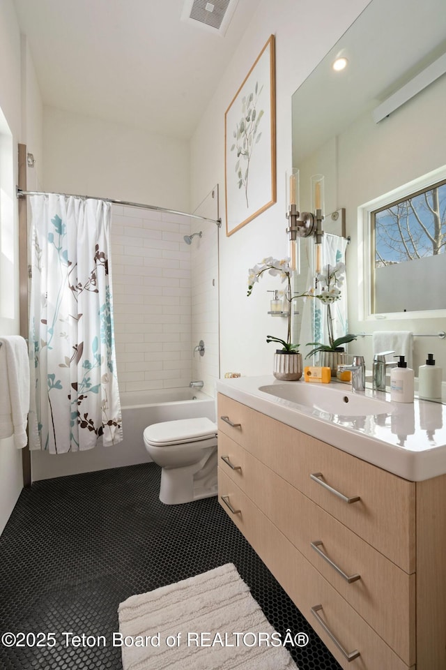 full bath featuring shower / tub combo, visible vents, toilet, tile patterned flooring, and vanity