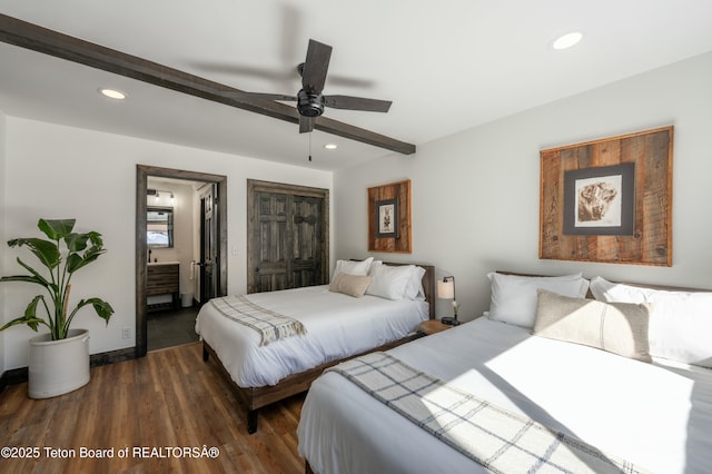 bedroom with a closet, wood finished floors, beamed ceiling, and recessed lighting