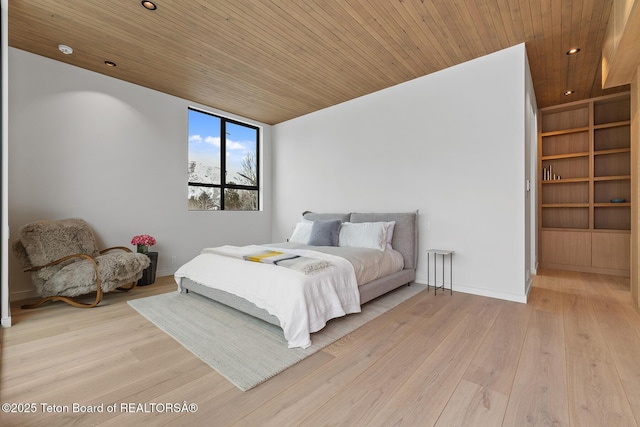 bedroom with recessed lighting, baseboards, light wood-style floors, and wood ceiling