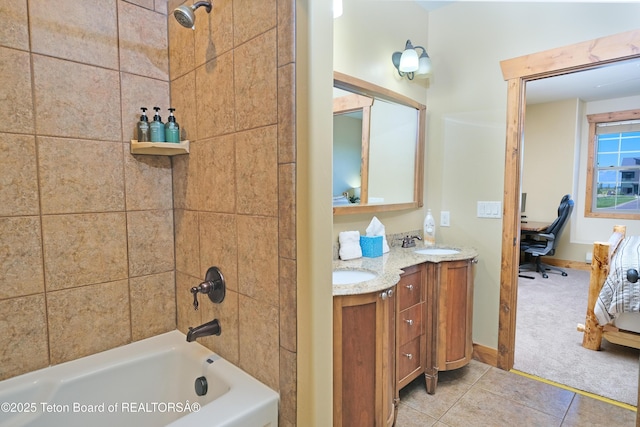 bathroom with double vanity, tile patterned flooring, a sink, and bathing tub / shower combination