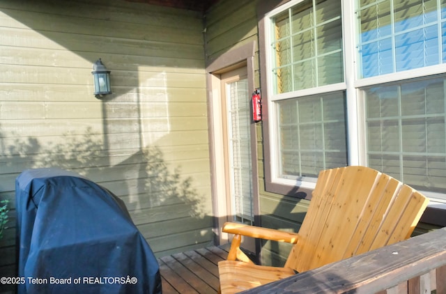 wooden deck with area for grilling