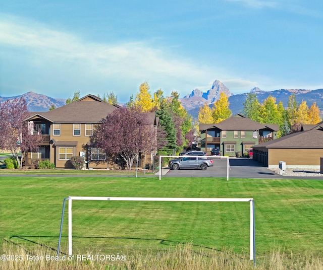 exterior space featuring a mountain view