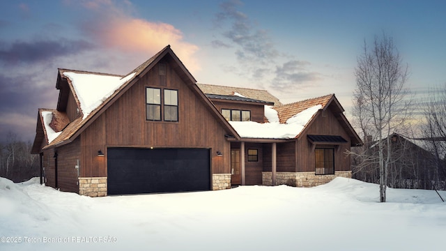 view of front facade featuring stone siding