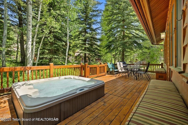 3102 W Arrowhead Rd, Teton Village, WY 83025 - deck featuring outdoor dining space and view of scattered trees