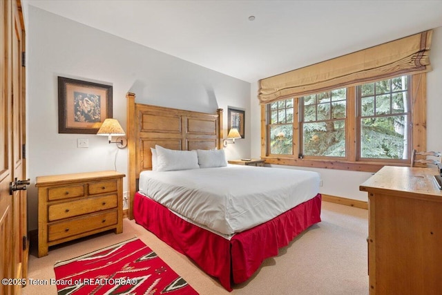 3102 W Arrowhead Rd, Teton Village, WY 83025 - bedroom featuring light carpet and baseboards