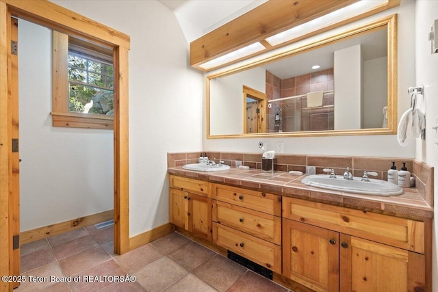 3102 W Arrowhead Rd, Teton Village, WY 83025 - full bathroom with double vanity and a stall shower