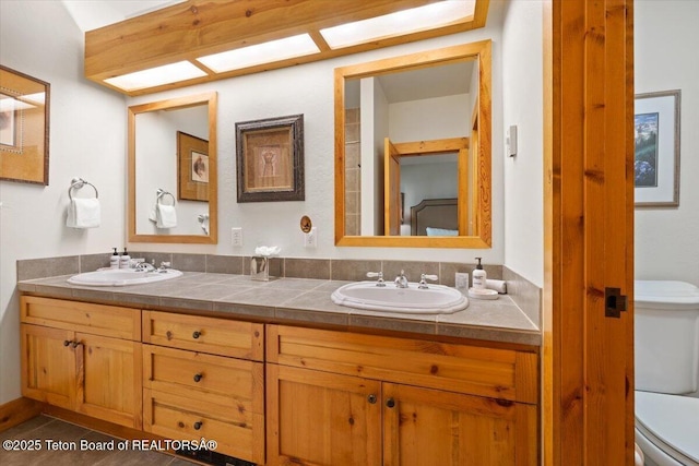 3102 W Arrowhead Rd, Teton Village, WY 83025 - full bath featuring toilet and double vanity