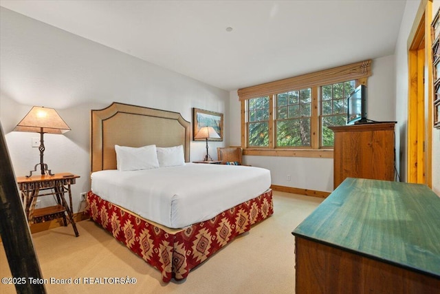 3102 W Arrowhead Rd, Teton Village, WY 83025 - bedroom with carpet flooring and baseboards