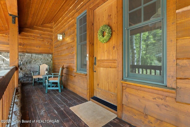 3102 W Arrowhead Rd, Teton Village, WY 83025 - property entrance with a porch