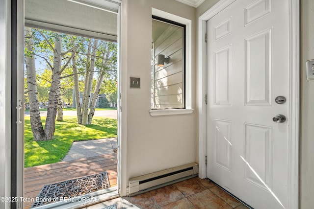 entryway featuring a baseboard heating unit and a wealth of natural light