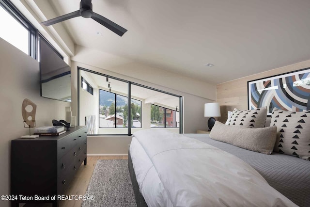 bedroom featuring light wood-style floors and ceiling fan