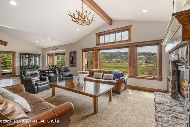2035 Tomahawk Trl, Victor, ID 83455 - living room featuring beamed ceiling, a stone fireplace, baseboards, high vaulted ceiling, and recessed lighting
