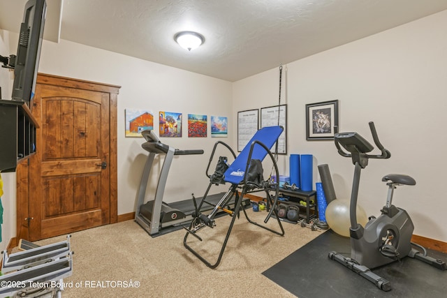 2035 Tomahawk Trl, Victor, ID 83455 - workout room with baseboards and carpet