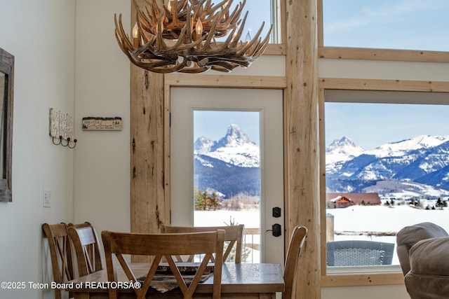 4535 Roxanne St, Tetonia, ID 83452 - dining space with a mountain view, plenty of natural light, and a chandelier